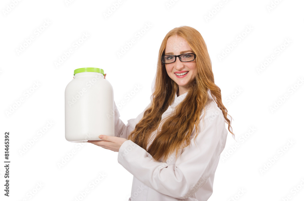 Young female doctor holding jar of protein isolated on white Young female doctor holding jar of protein isolated on white