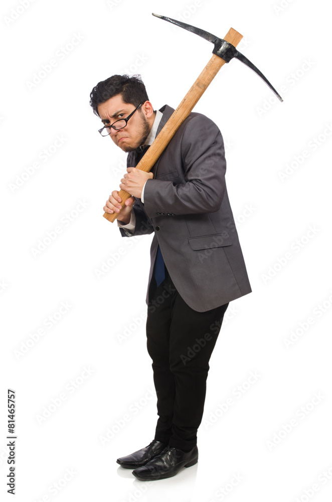 Young businessman holding a tool isolated on white