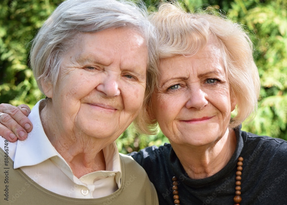 Senior and mature women in garden.