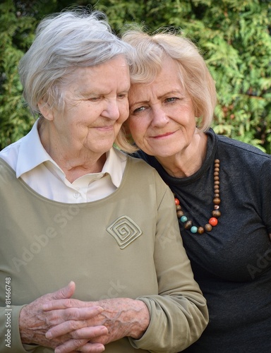 Senior and mature women in garden.