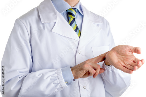 Man in medical coat feeling his pulse