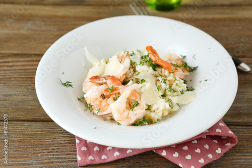 Rice with shrimp and dill on a plate