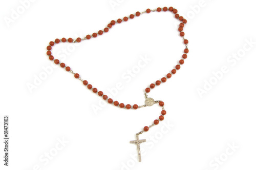 Murais de parede Wood rosary and metal cross with slightly unfocused beads