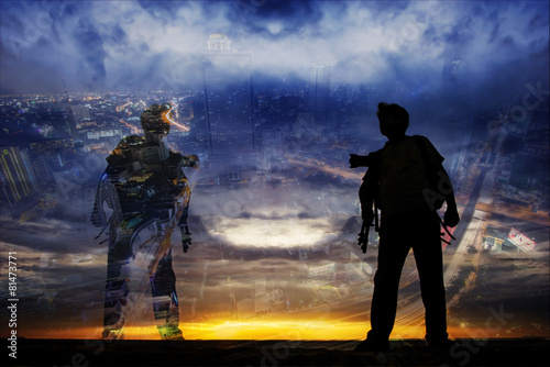 Double exposure of young man with sunset and night city.