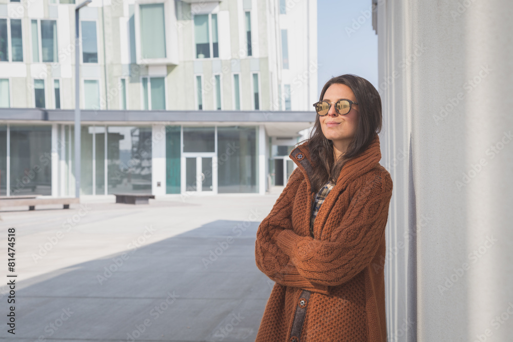 Fototapeta premium Beautiful girl posing in an urban context