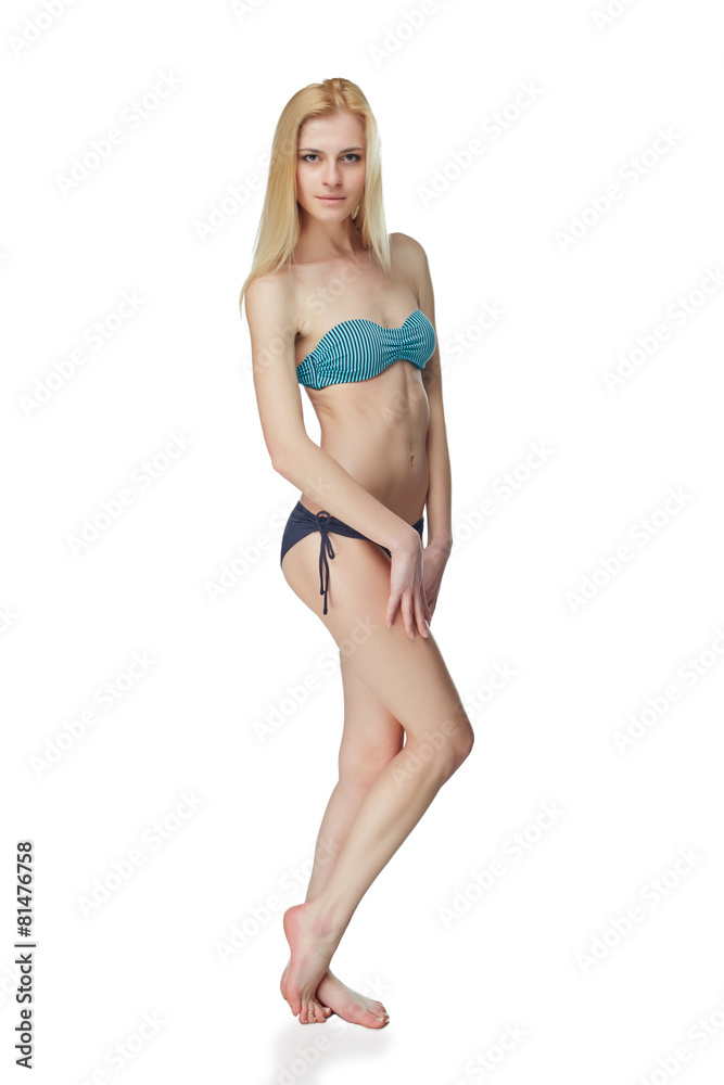 Full length beautiful slim tanned woman in bikini, isolated on w Full length beautiful slim tanned woman in bikini, isolated on w