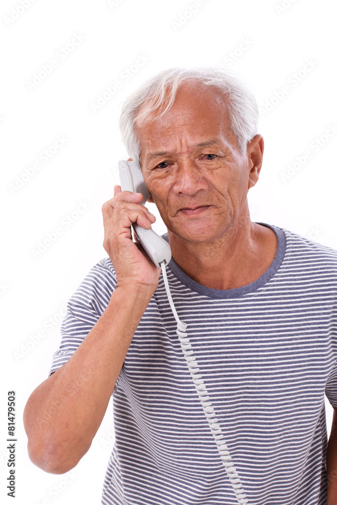 sad, frustrated, negative senior old man talking via home teleph sad, frustrated, negative senior old man talking via home teleph