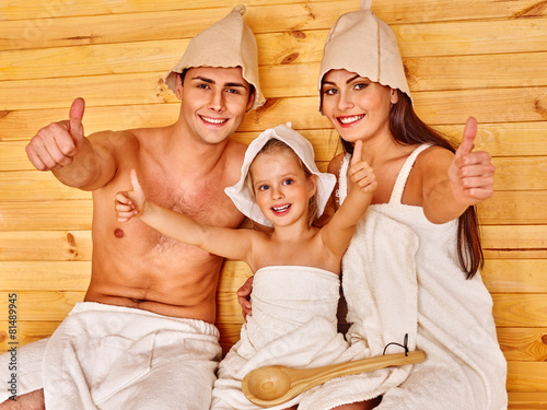 Group people in hat  at sauna.