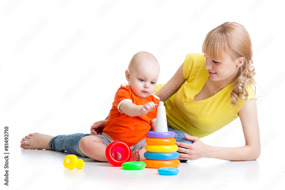 kid boy and mother play together with toy kid boy and mother play together with toy