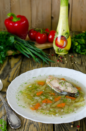Homemade soup of fish and pearl barley