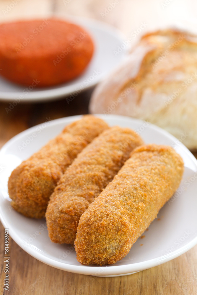 meat croquete, cheese and bread