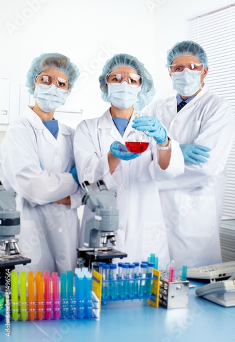 Group of medical doctors in laboratory.