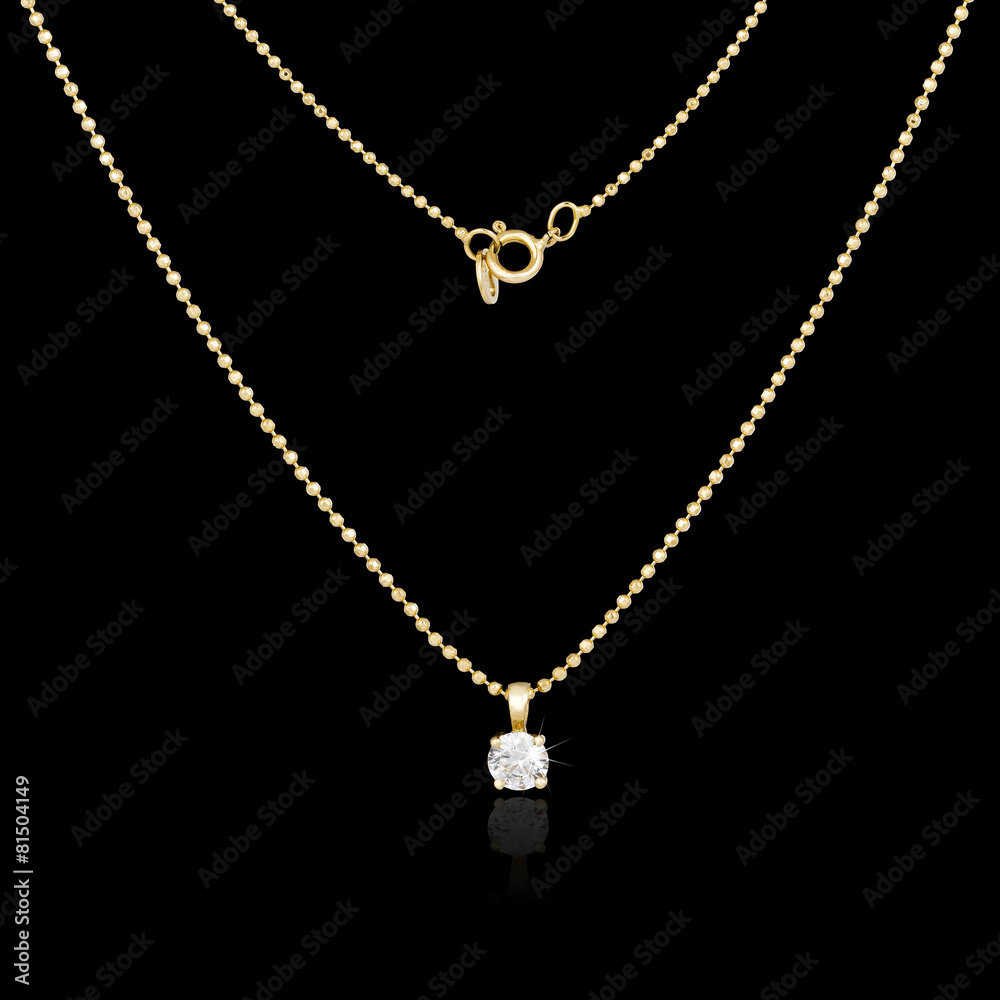 Golden necklace isolated on black background Golden necklace isolated on black background