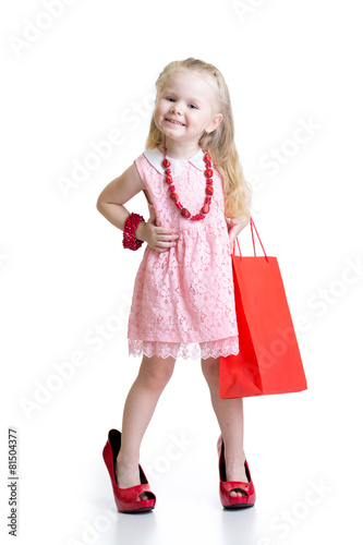 little girl trying her mom'...