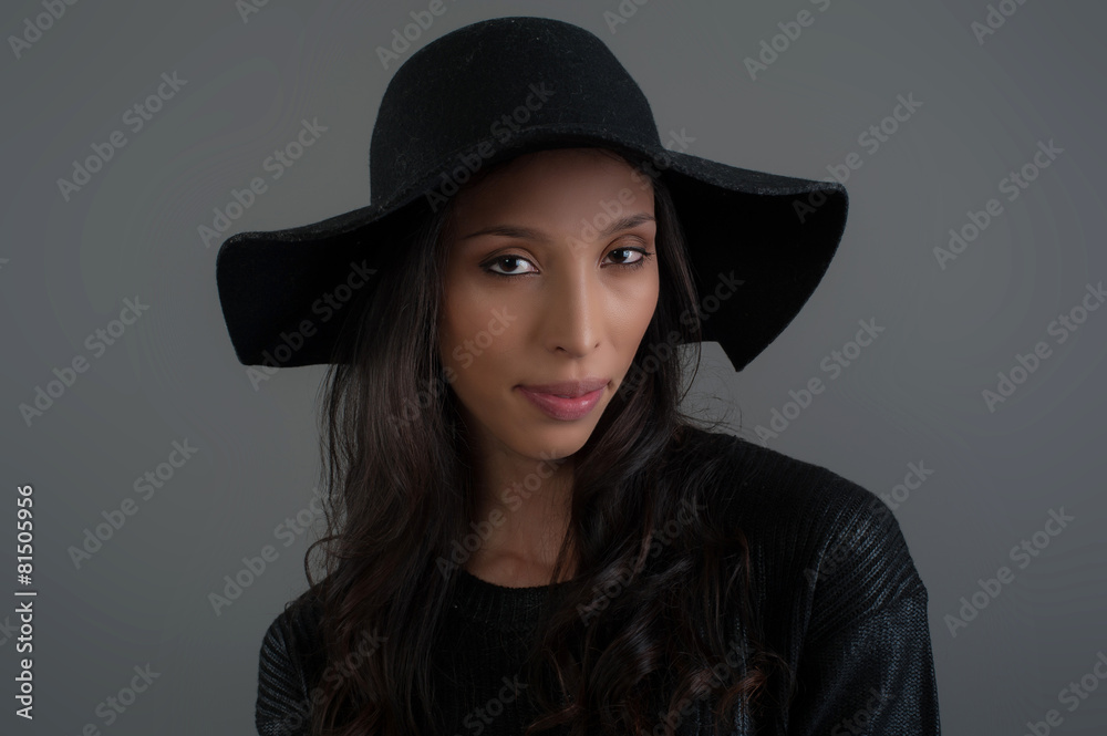 Hispanic fashion model posing at studio. Close up portrait. Hispanic fashion model posing at studio. Close up portrait.