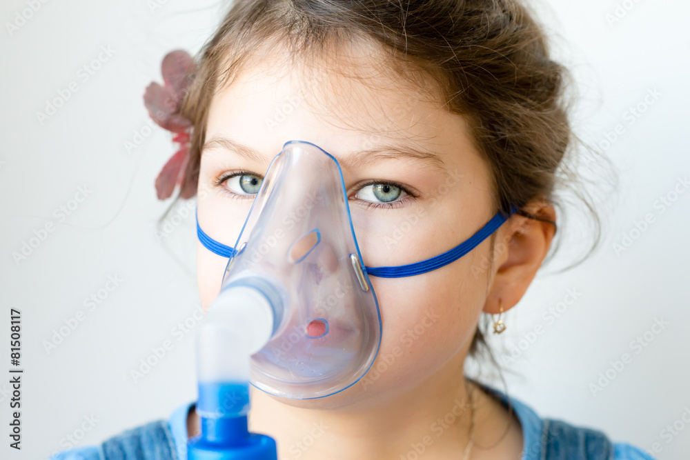 girl with asthma / allergy inhaler - inhalation mask Stock Photo | Adobe  Stock