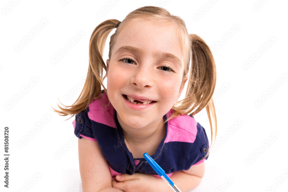 Blond kid girl student with spiral notebook in desk Blond kid girl student with spiral notebook in desk