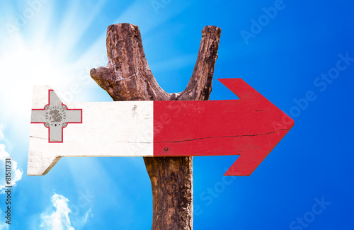 Malta Flag wooden sign with sky background