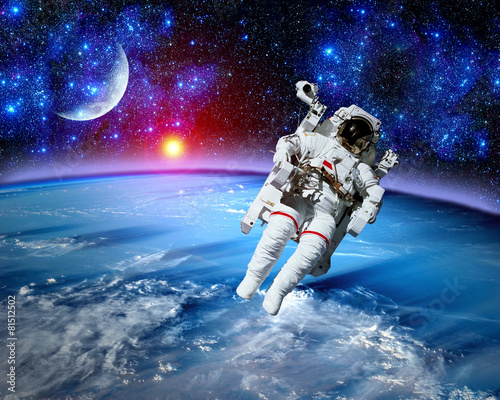 Fototapeta Naklejka Na Ścianę i Meble -  Astronaut Spaceman Earth Moon