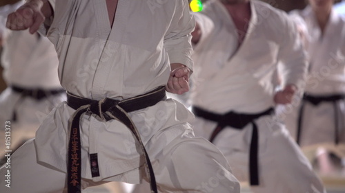 group of people practicing karate kata