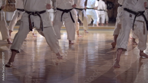 group of people practicing karate kata