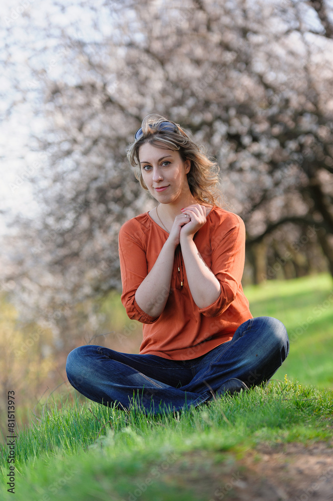 Portrait of beautiful girl in the spring garden Portrait of beautiful girl in the spring garden