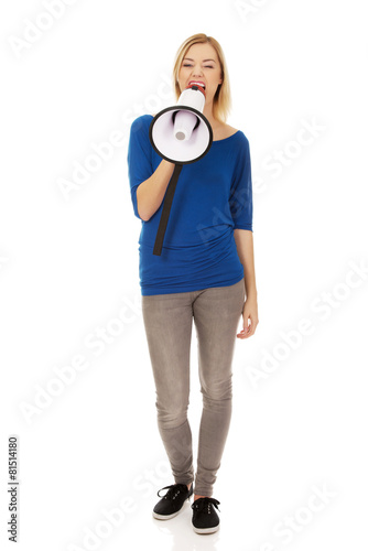 Attractive woman with megaphone. photo
