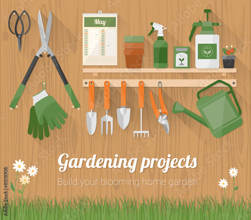 Gardening tools on a wooden wall