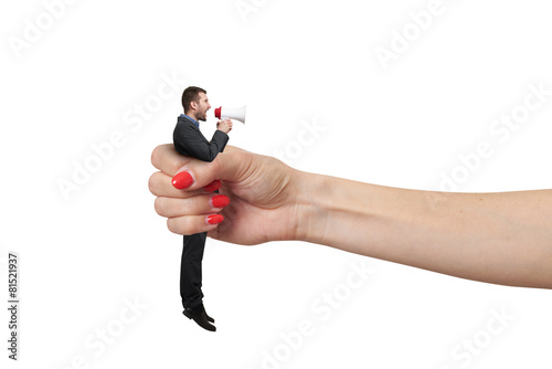 hand holding in fist small man photo