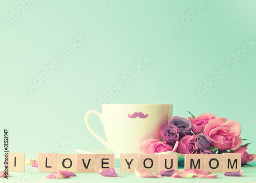 Vintage roses and objects with I Love You Mom message