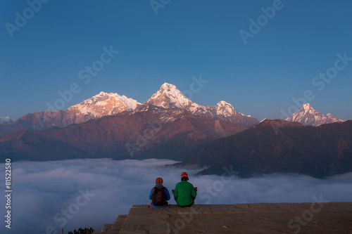 Men meditating in Himalaya Mountains View from Poon Hill 3210m a photo