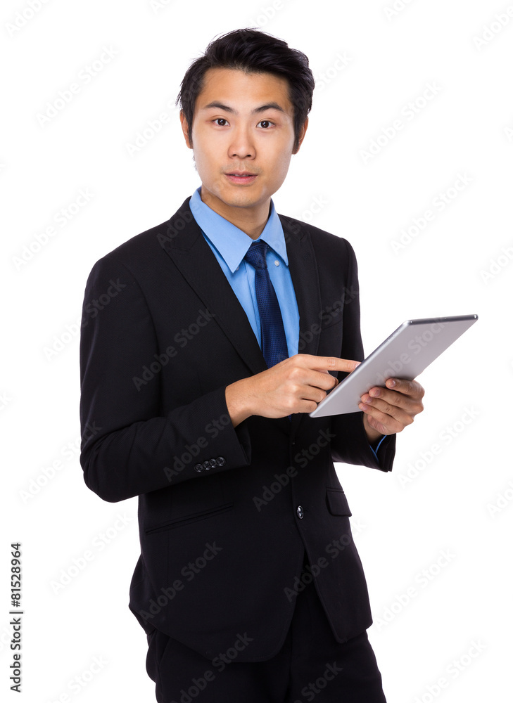 Asian business man using tablet computer Asian business man using tablet computer