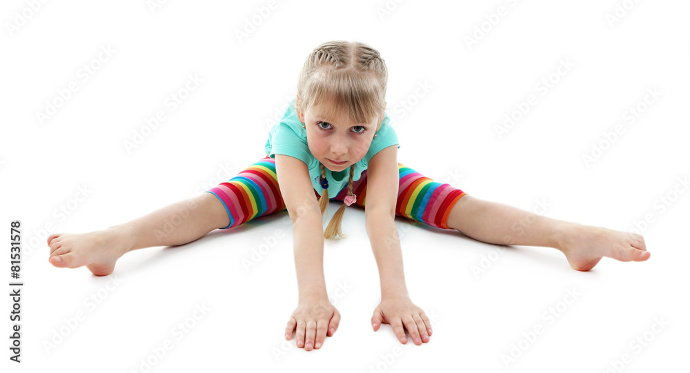 Little girl doing exercises isolated on white Little girl doing exercises isolated on white
