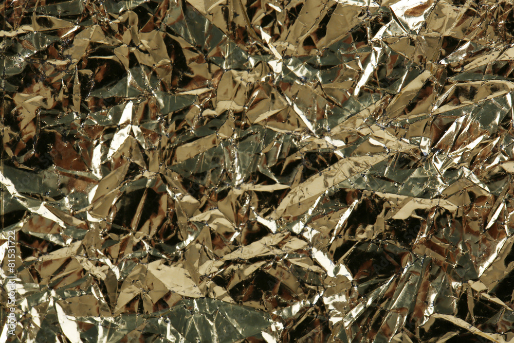 Crumpled color foil texture background