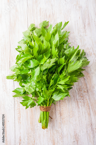lovage leaves on a wooden table