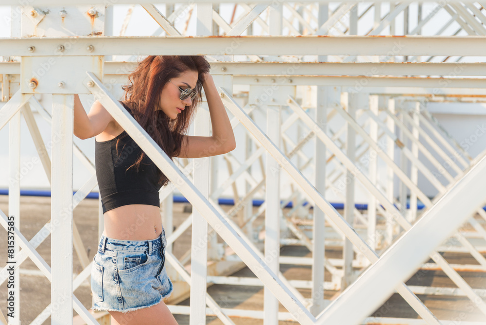 fashion shot of woman wearing sun glasses fashion shot of woman wearing sun glasses