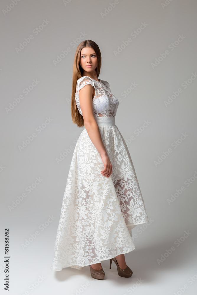 Young woman in a white dress Young woman in a white dress