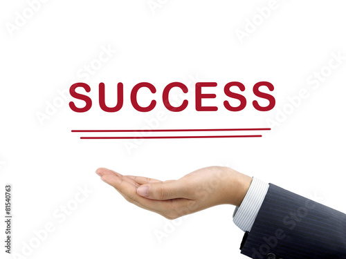 success word holding by businessman's hand
