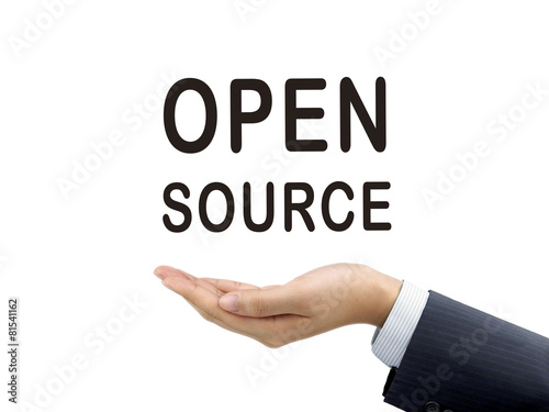 open source word holding by businessman's hand © JoyImage
