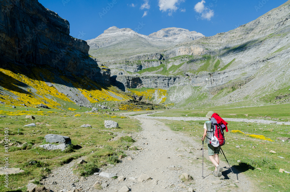 Girl  hiking in the Spanish Pyrenees (GR11 trail).