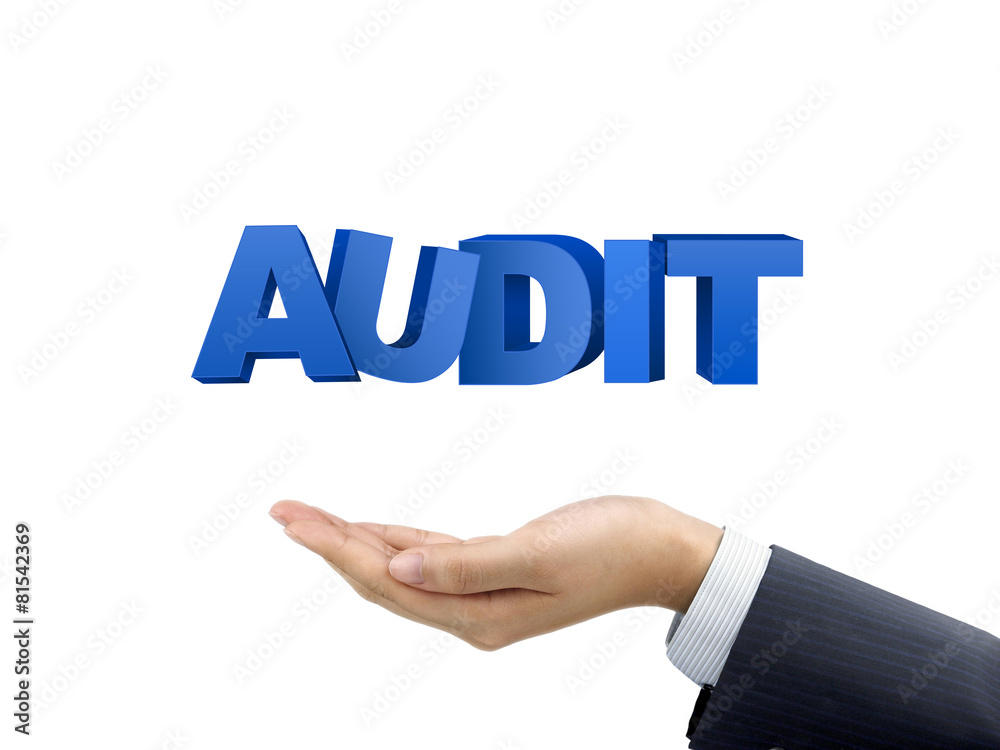 businessman's hand holding audit words businessman's hand holding audit words