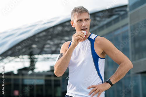 Man Eating Energy Bar