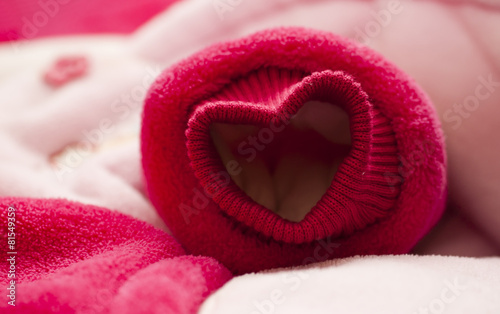 Baby pink sweater in valentine heart shape © naufalmq