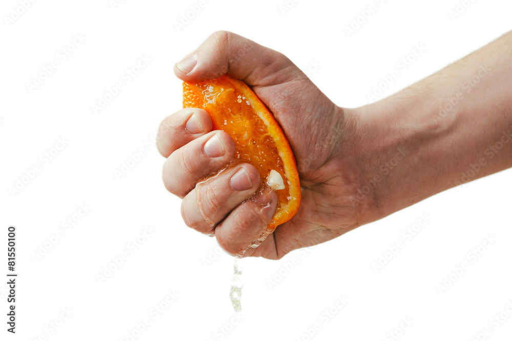man dramatic squeezes orange. Conceptis tired from work. man dramatic squeezes orange. Conceptis tired from work.