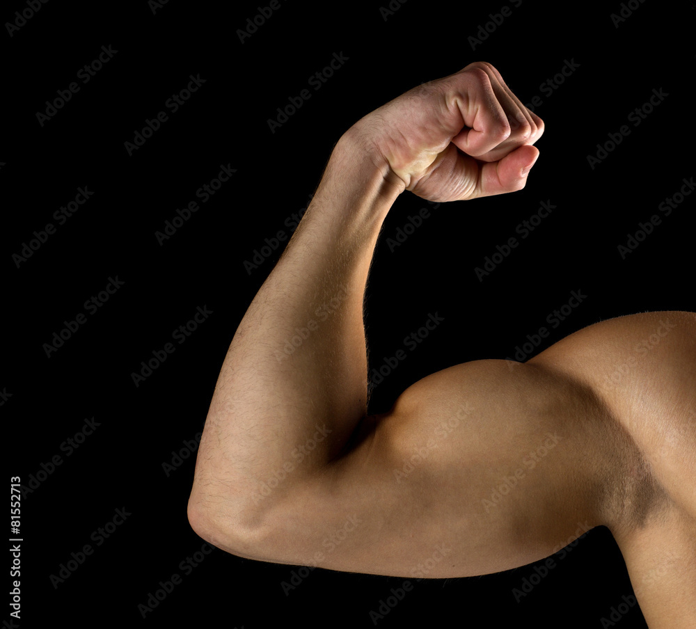 close up of young man showing biceps close up of young man showing biceps