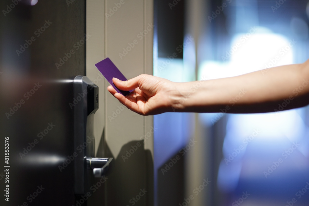 Opening hotel door with keyless entry card - obrazy, fototapety, plakaty 