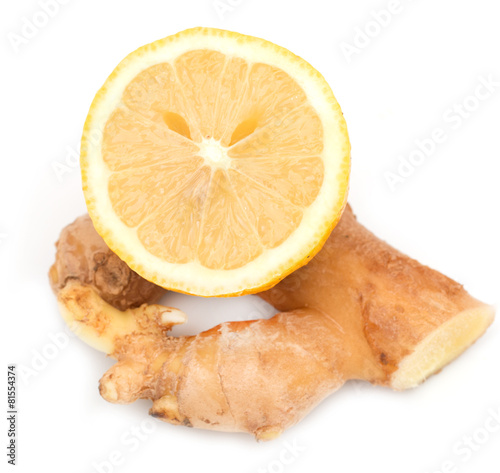 ginger root on white background with lemon