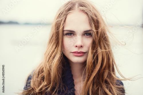 portrait of a beautiful girl on a cold windy day