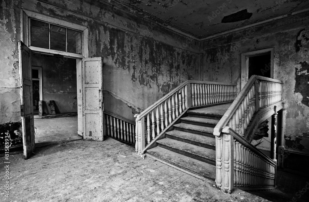 Black and white staircase in the abandoned mansion