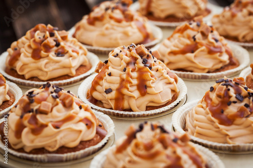 Caramel cupcakes on a baking tray